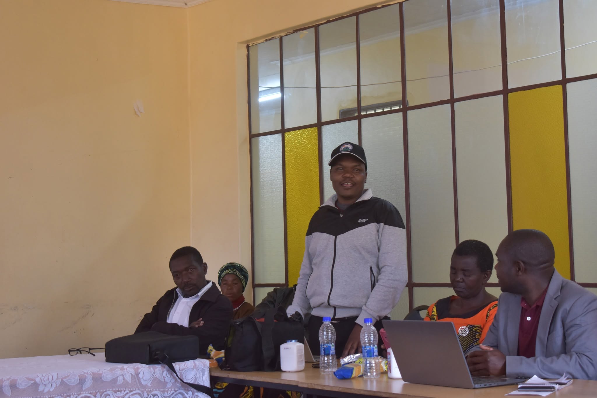 Andrew Bwanali speaking during the validation meeting yicod, IM Swedish Development Partner